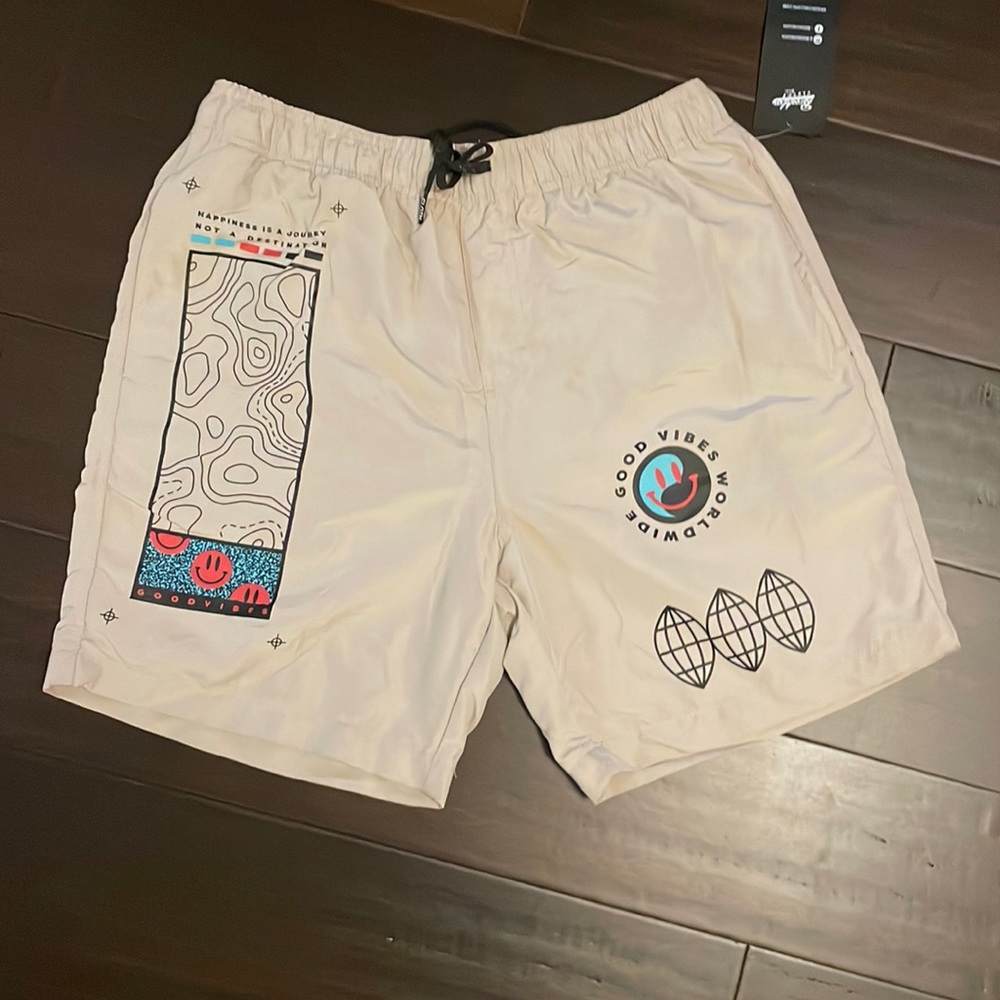 Beige swim shorts
